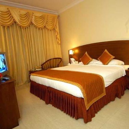 Aj International Hotel Bangalore Cameră foto