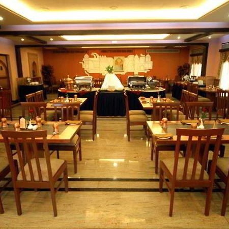Aj International Hotel Bangalore Restaurant foto